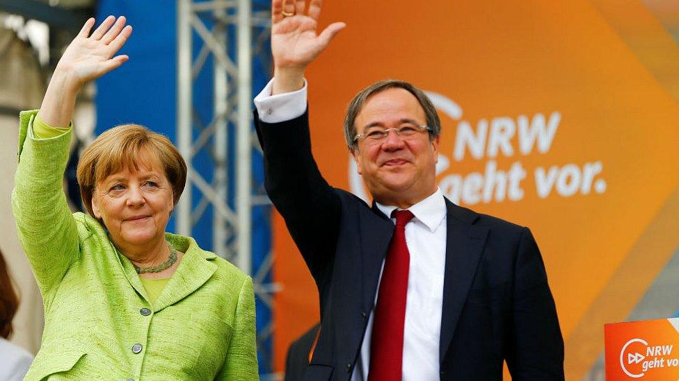 CDU candidate Armin Laschet and German Chancellor Angela Merkel attend an election rally in Aachen, Germany, May 13, 2017