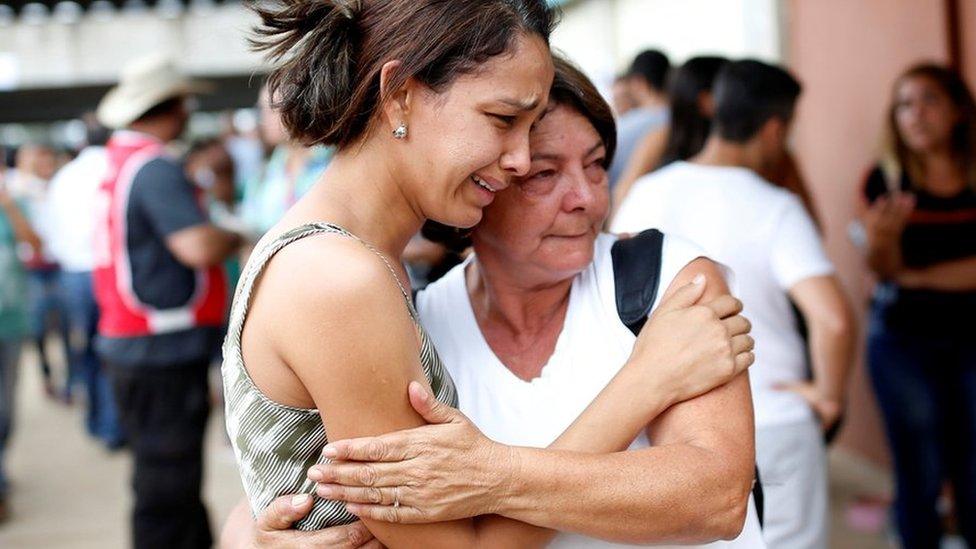 Relatives of those who remain missing following the dam collapse in Brumadinho, Brazil, 26 January 2019