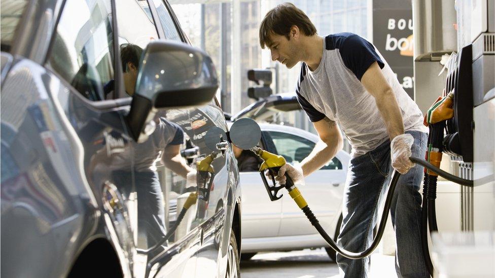 Man filling up car