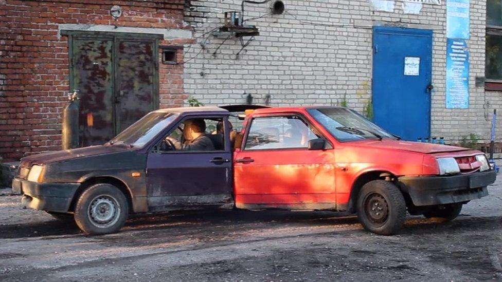 Three Russian cars welded together in an attempt to make a car-based fidget spinner