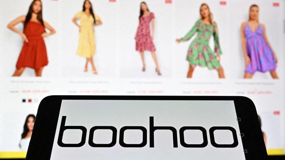 Boohoo site on a phone.