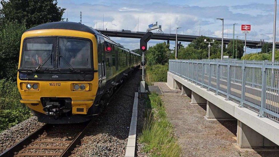 A train at Portway Park and Ride station