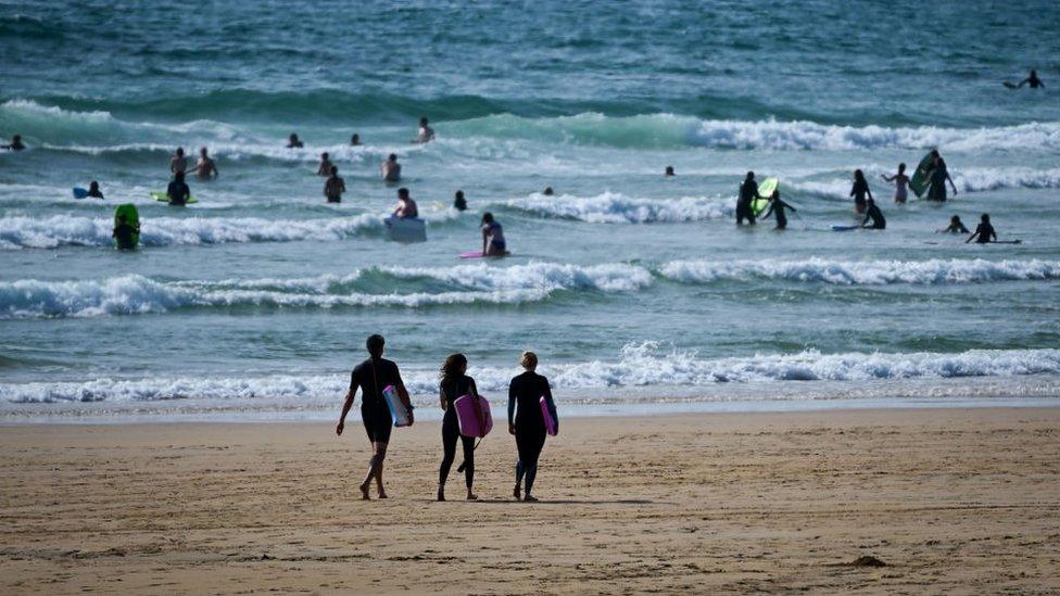 people-at-the-beach-in-cornwall.