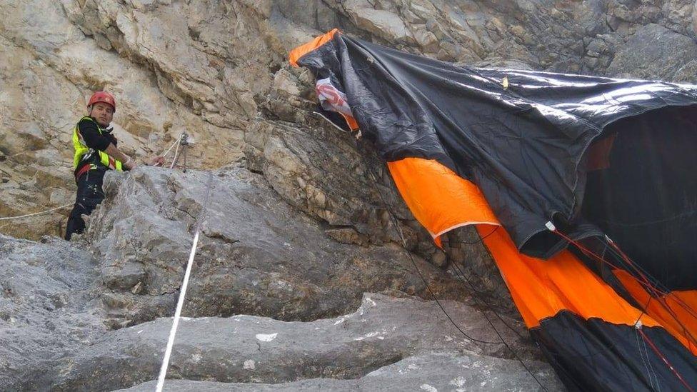 Italian rescue workers at scene