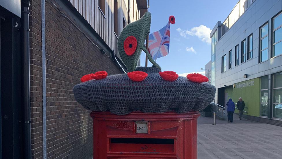 Topper on Barnsley post box