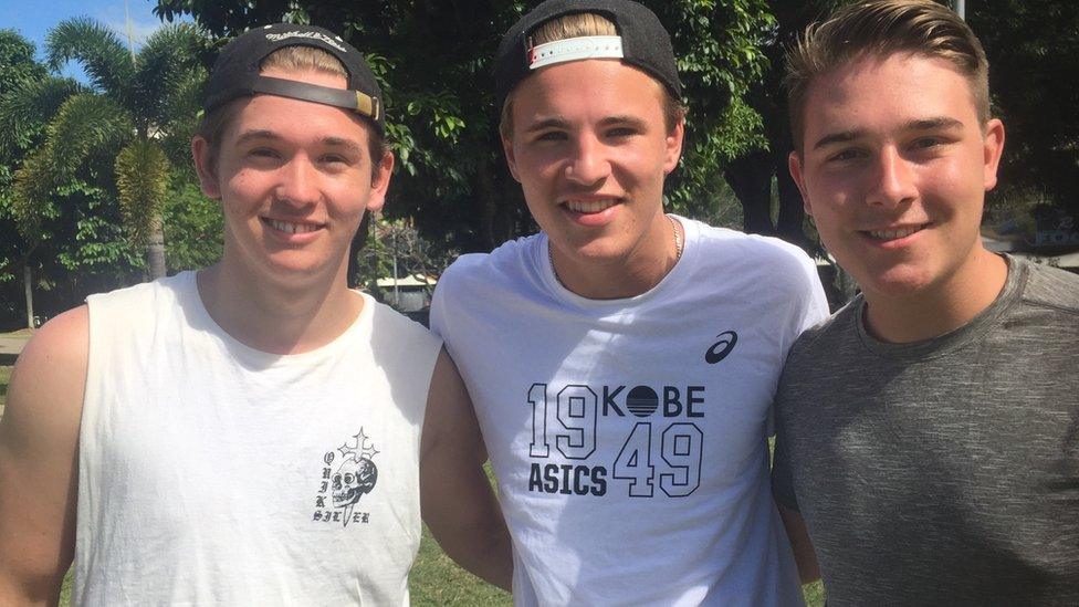 Backpacker Tom from north Wales is pictured with two friends