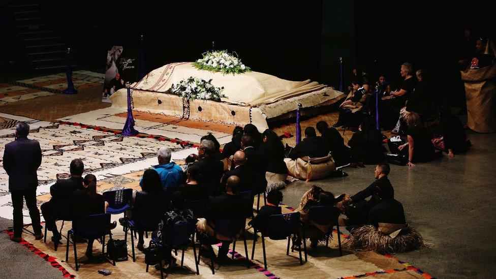 The casket containing the body of Jonah Lomu sits at the front of the memorial