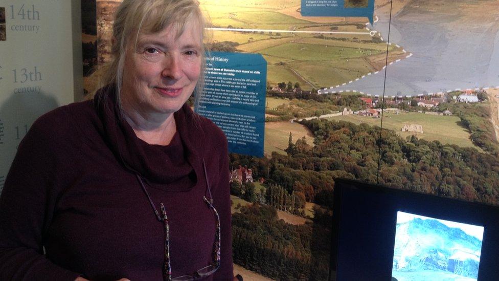 Jane Hamilton stood next to a museum display