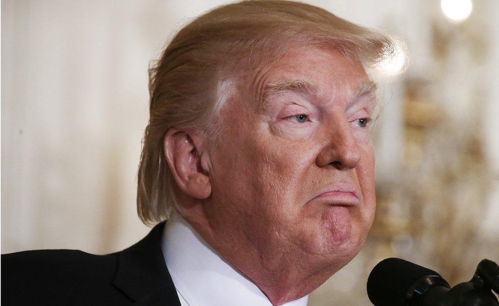 U.S. President Donald Trump stands during a news conference announcing Alexander Acosta as the new Labor Secretary nominee in the East Room at the White House on February 16, 2017