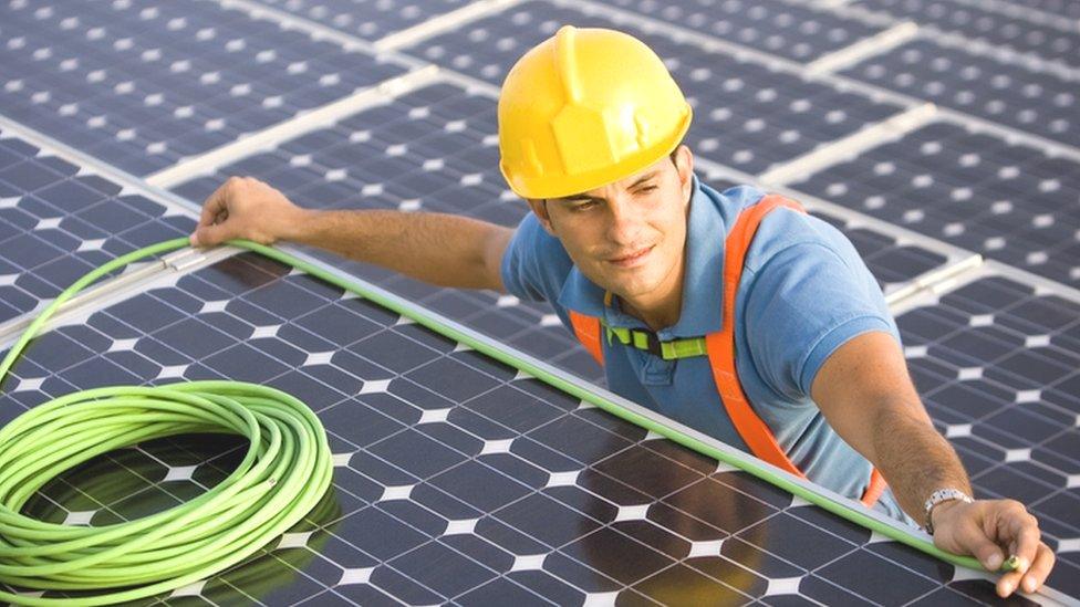 Electrician working at solar farm