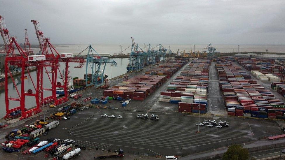 General view of stacked shipping containers at Peel Ports Liverpool docks in Liverpool