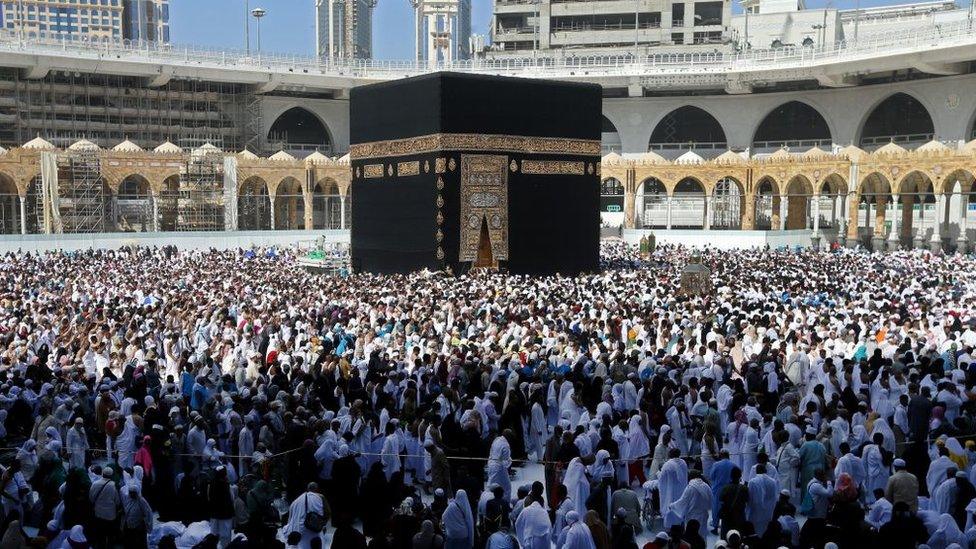 Muslim pilgrims walk around the Kaaba (Tawaf al-Wadaa), Islam's holiest shrine, at the Grand Mosque in Saudi Arabia's holy city of Mecca on February 27, 2020