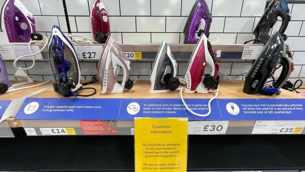 Items deemed non-essential covered up in a Tesco store in Cardiff