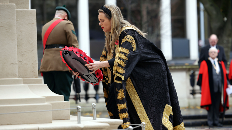 Lord Mayor of Belfast Kate Nicholl lays a wreath in Belfast