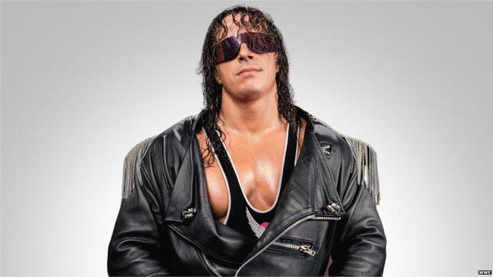 Bret Hart looking directly at the camera in a photo shoot