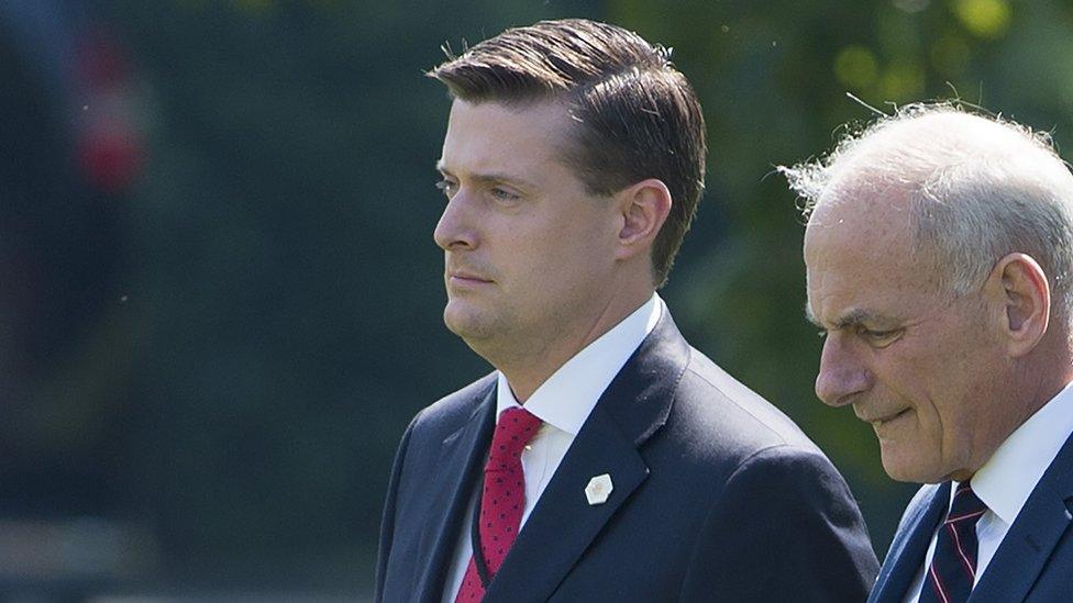 Rob Porter walks with Chief of Staff John Kelly.