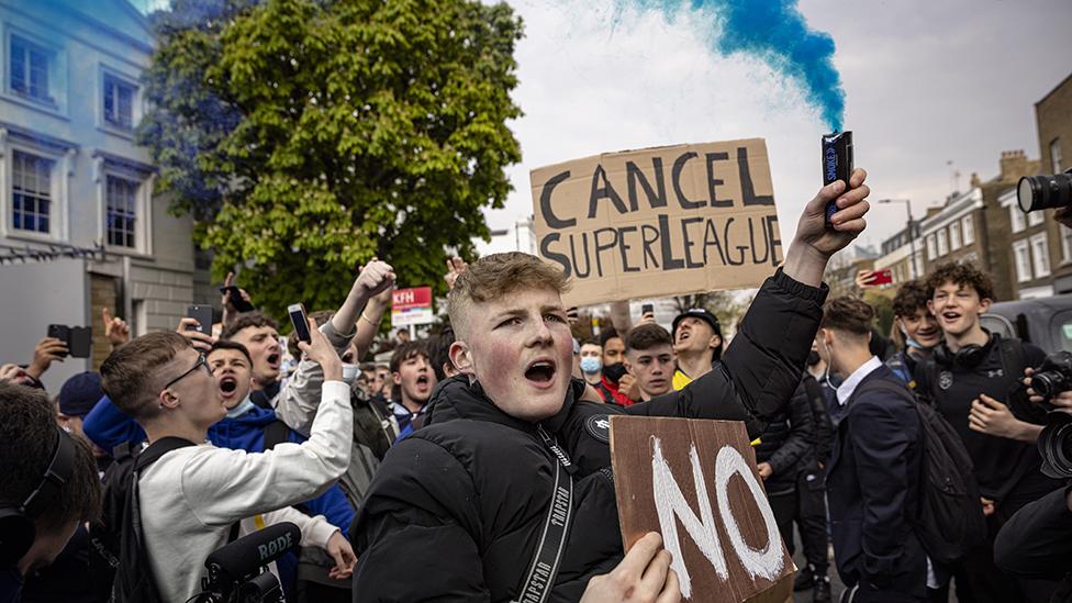 Fans of Chelsea Football Club protest against the European Super League outside Stamford Bridge on April 20, 2021 in London, England.