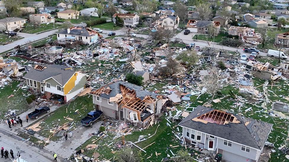 An aerial shot of destroyed houses in America after a tornado.