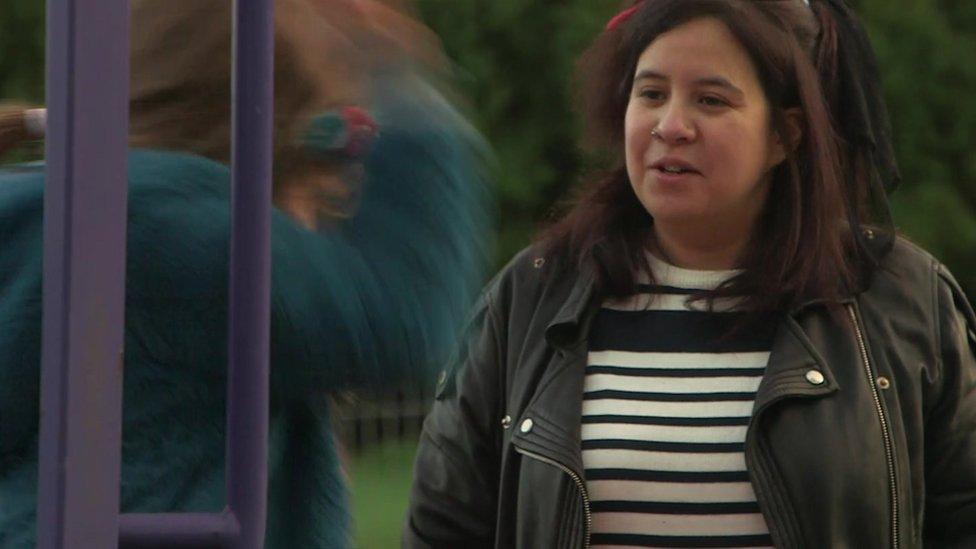 Becka with her daughter at playground