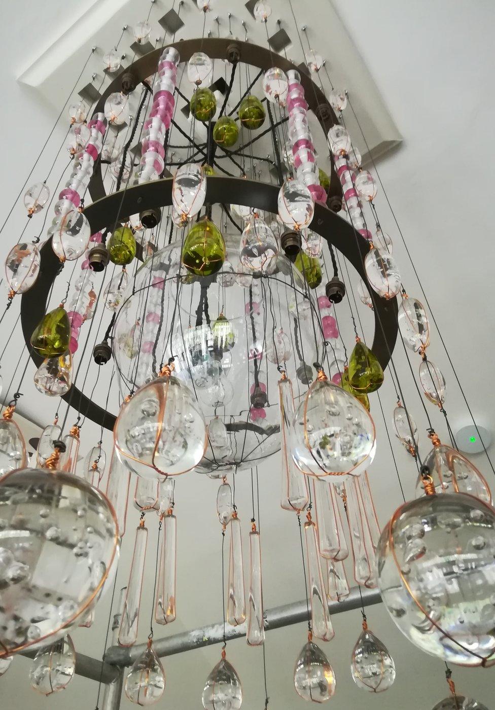 The chandelier was recreated by a team of specialists