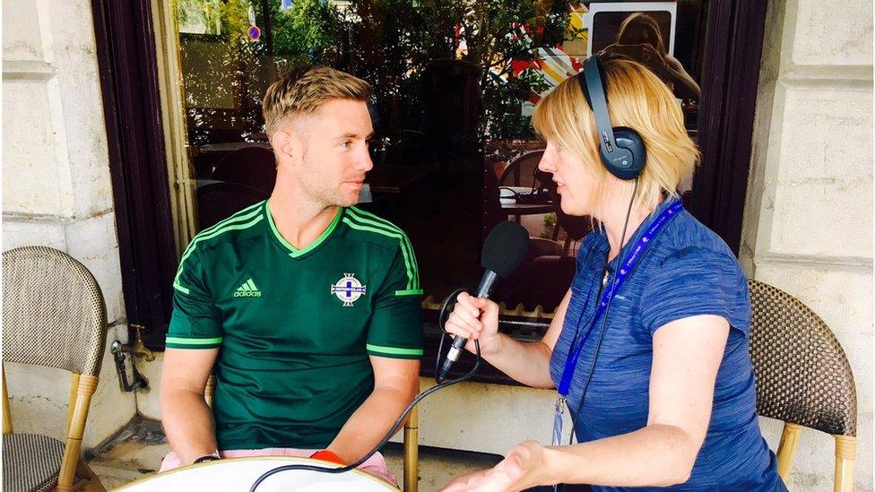 Travel blogger Johnny Ward speaks to BBC Radio Ulster's Helen Jones about his journey to France to support Northern Ireland