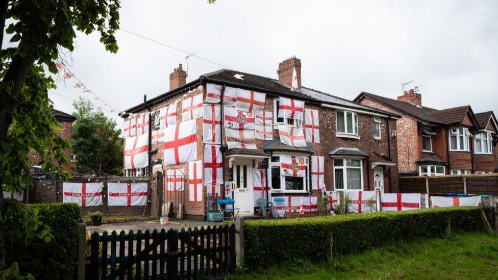 Manchester house with England flags