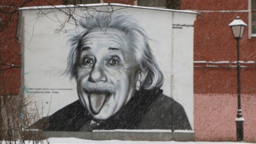 a mural of Albert Einstein sticking his tongue out in St Petersburg