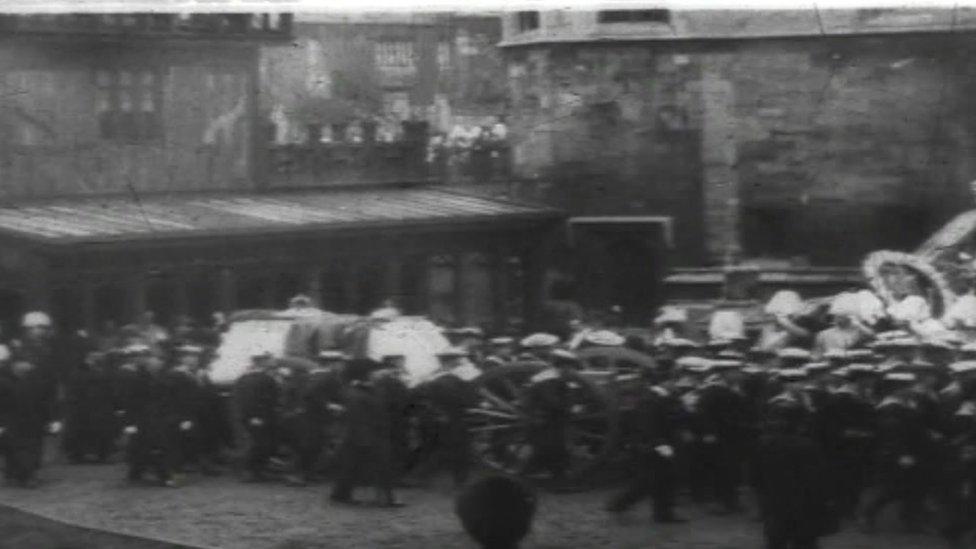 Naval officers beside Queen Victoria's coffin