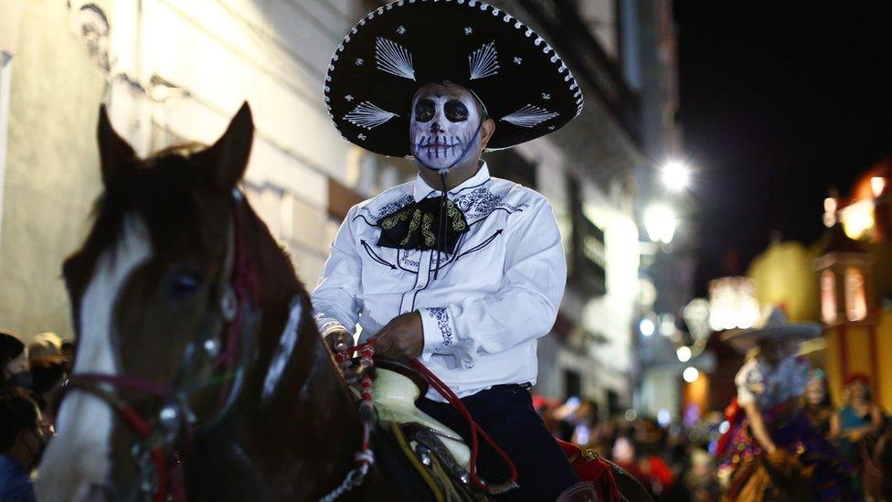 Man on horseback on Day of the Dead