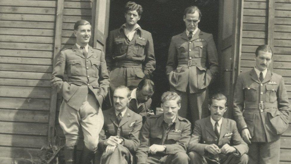 Alastair Gunn with his roommates outside Hut 122 in Stalag Luft III.