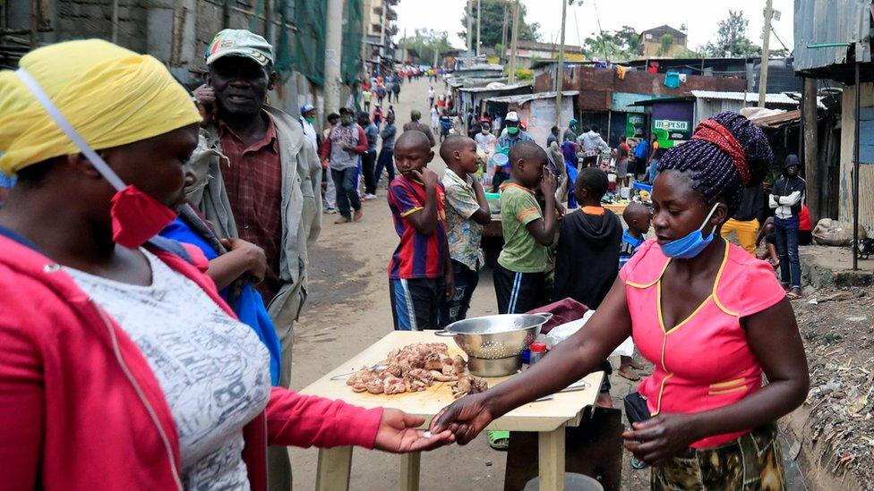 Woman selling chicken