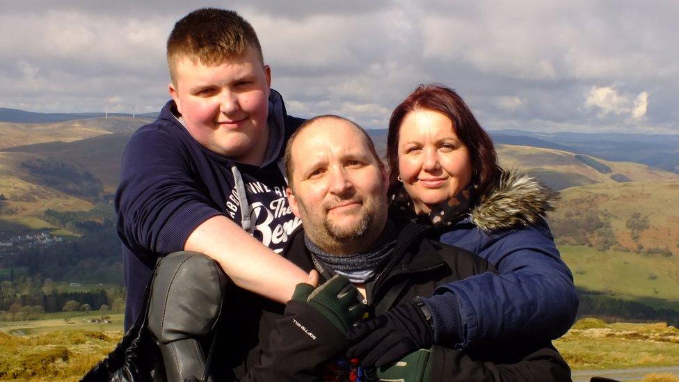 Rev Martinson with wife Haley, right and son Seth, left