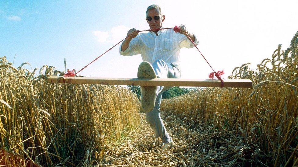 Dave Chorley making a crop circle with a plank of wood in 1991