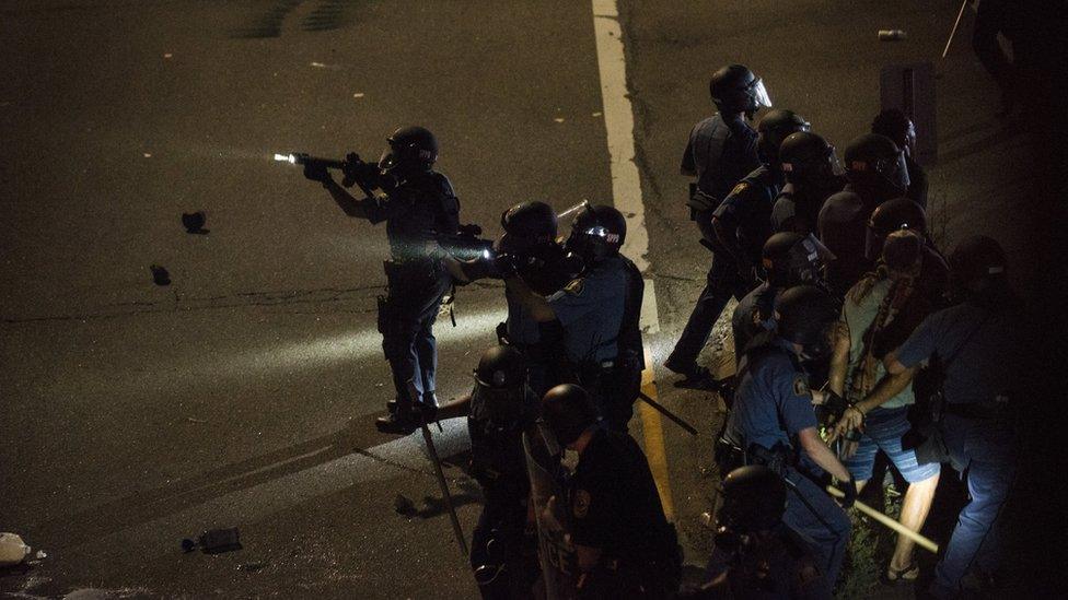 Two protestors are arrested on a highway embankment on July 9, 2016 in St. Paul, Minnesota.