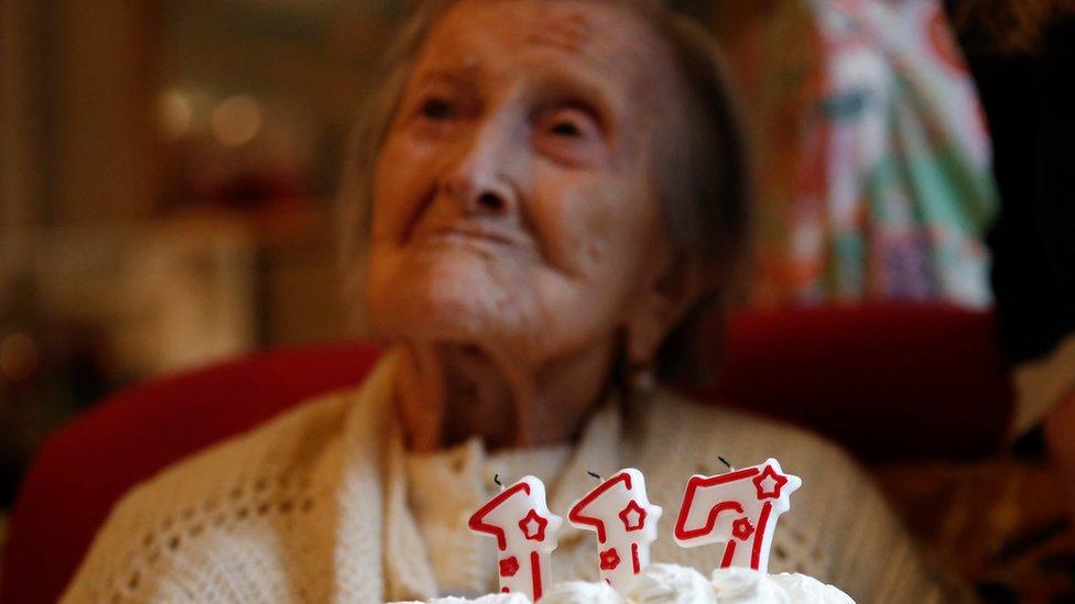 Ms Morano is pictured behind a cake with candles marking 117 years in the day of her birthday