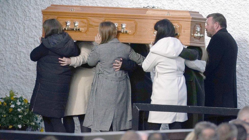 Hugh Kelly's coffin being carried into St Michael's Church