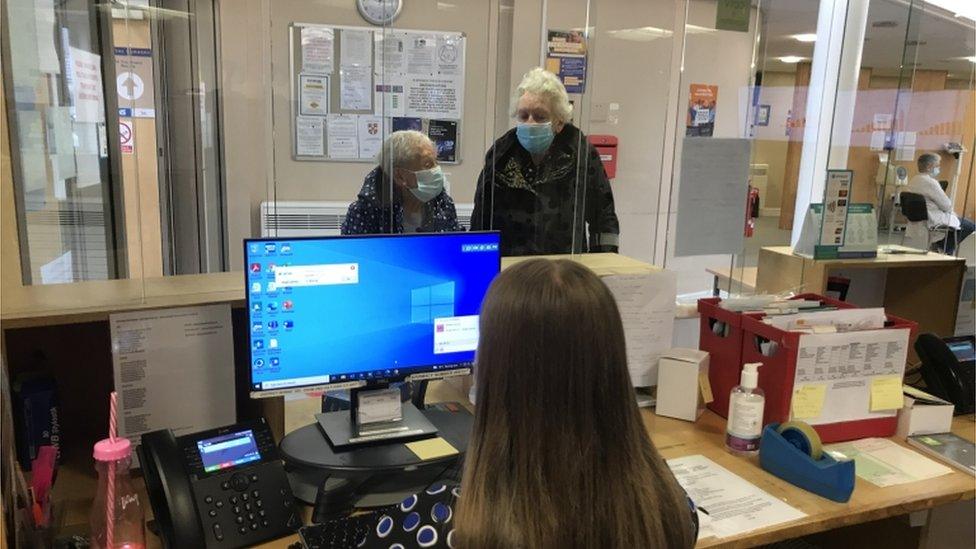 Patients arriving at reception