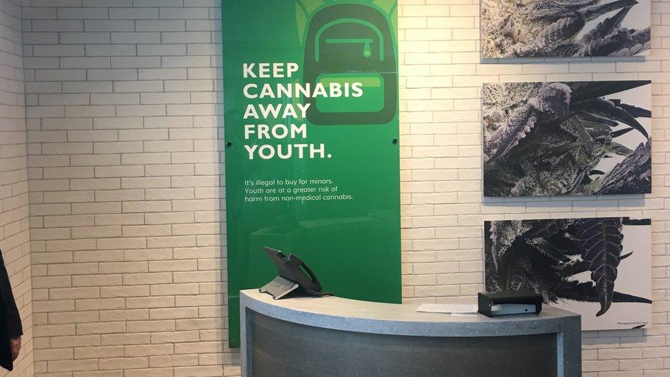 A sign at a cannabis store in British Columbia warns to keep the product away from children