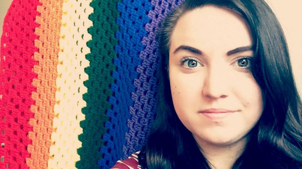 Rachel Hobbs Denton and her rainbow quilt