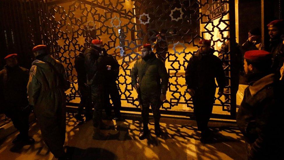 Palestinian security forces loyal to Hamas stand outside the Rafah border crossing with Egypt after the Palestinian Authority withdrew its staff (7 January 2019)