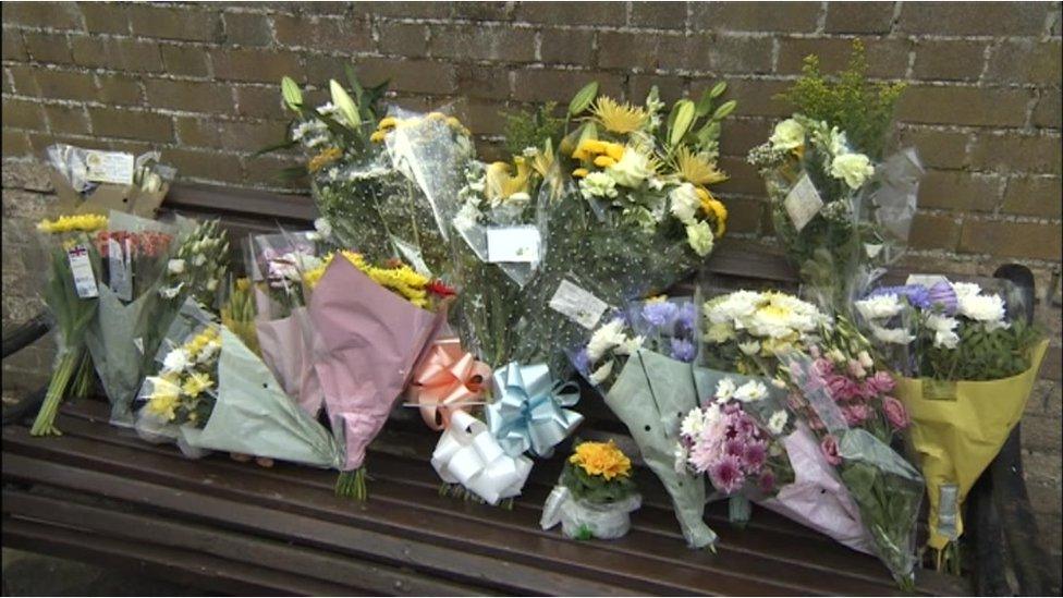 flowers on bench