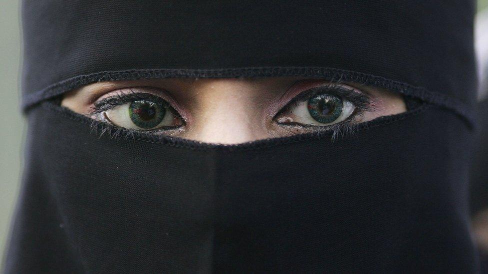 A woman wearing a niqab