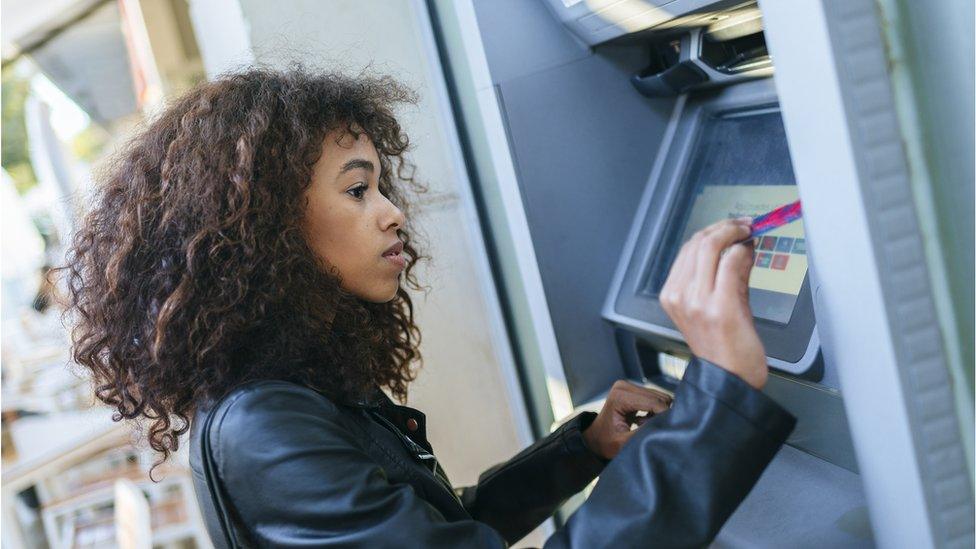 woman at atm