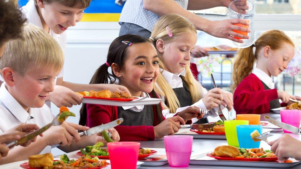 Children eating school dinners