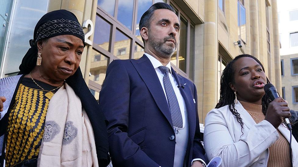 Aamer Anwar and Kadi Johnson outside public inquiry with Sheku's mother Aminata Bayoh