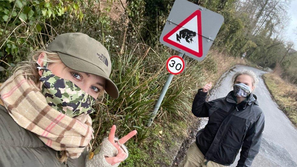 Katie and a colleague on location