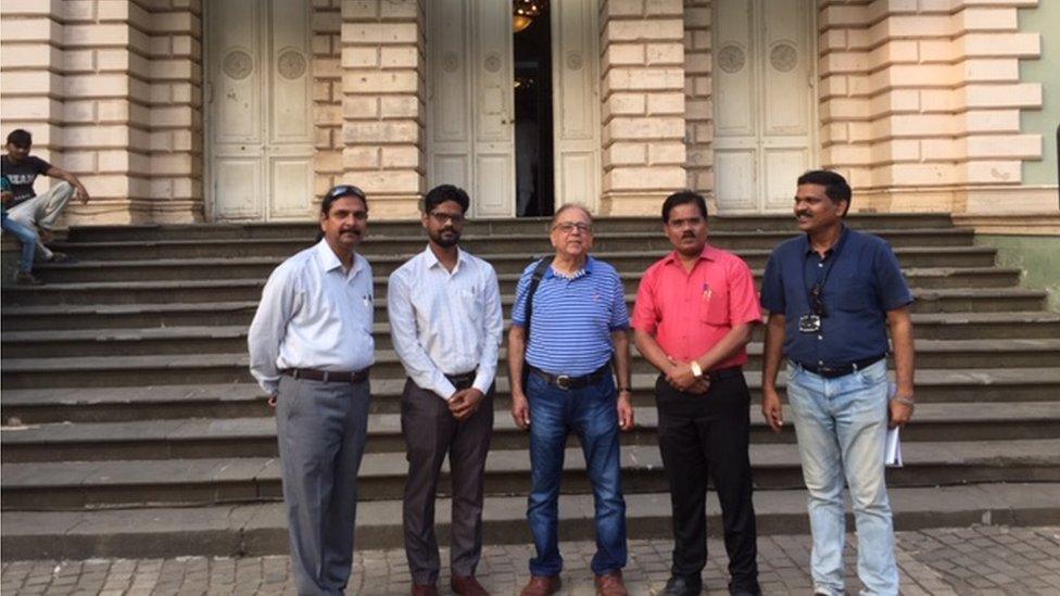 Arun Kotnis and the restoration team