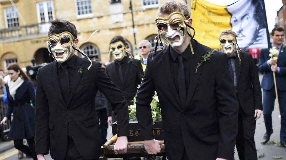 People parading the streets of Stratford-upon-Avon