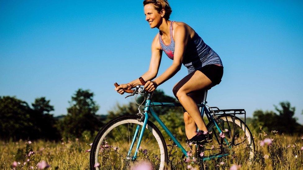 Kate Strong riding a bike