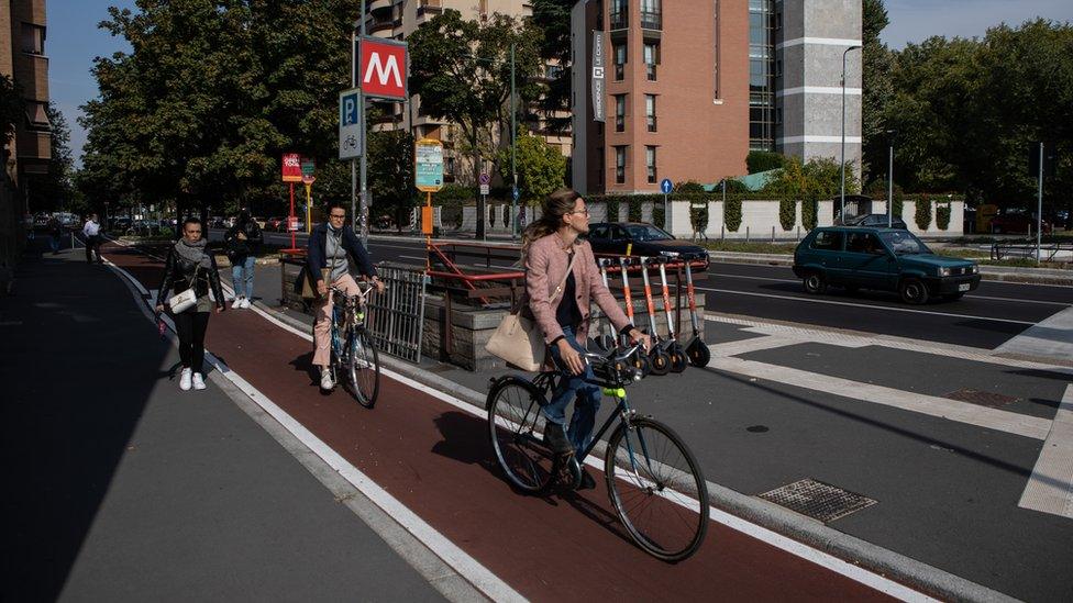 Cyclists ride on a brand new cycle path on Via Monte Rosa on September 30, 2020 in Milan